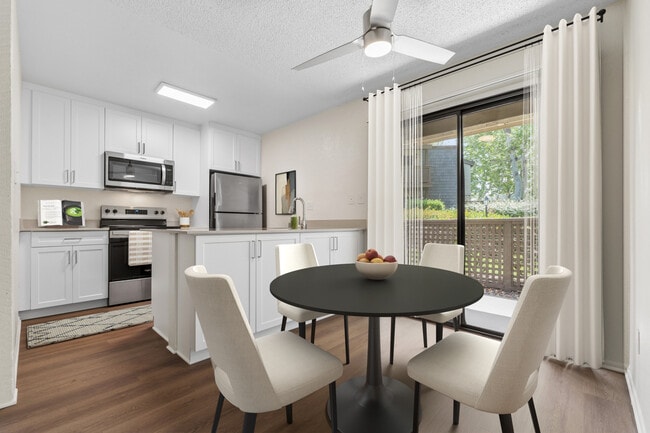 Renovated Package I kitchen and dining room with hard surface flooring