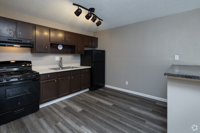 Aesthetic Spotlighting Accenting Kitchen - Arbor Village Apartments