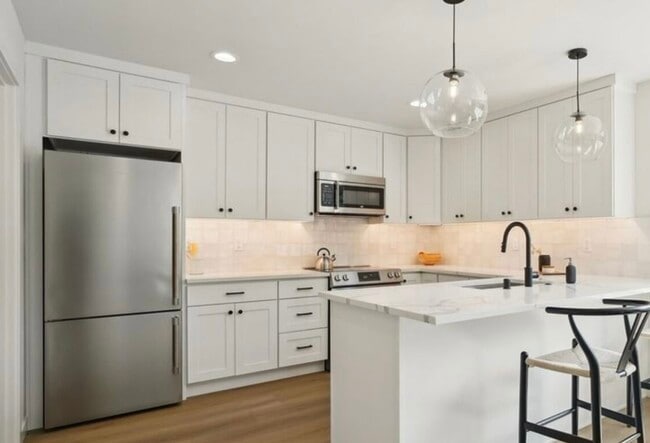 Kitchen with stainless steel appliances - 20313 14th Ave NE