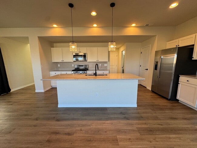 Photo - Spacious 3-Bedroom, 3-Bathroom Two-Story Home with Modern Finishes & Fenced Yard