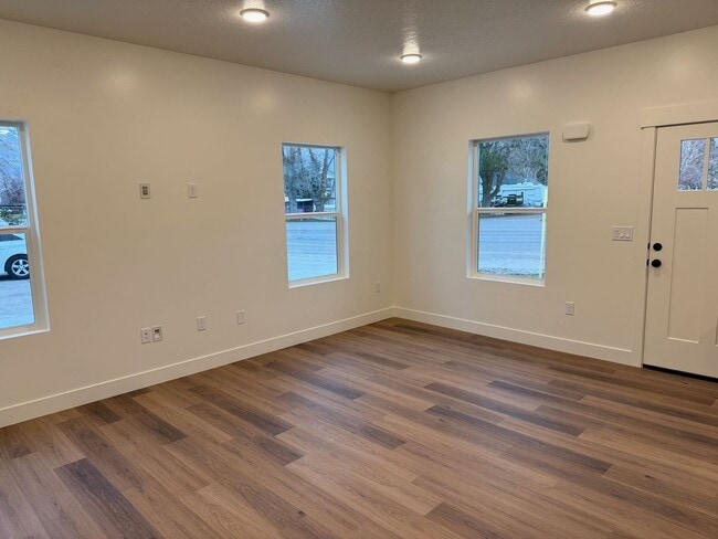 Photo - Half off first months rent - Beautiful townhome with 2 car garage, Central Air and Master Suite