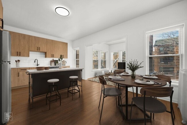 Photo - “Spacious 4-Bedroom Duplex in Rogers Park With In-Unit Laundry & Pet-Friendly Living!” Unit 7647-1