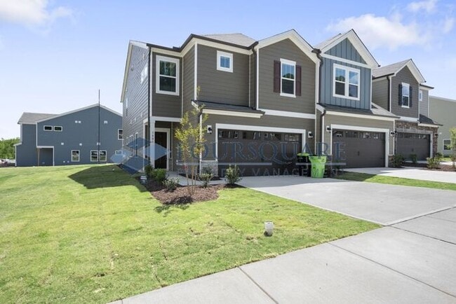 Photo - End-Unit Townhome with Loft, Open Floor Plan & Patio, Conveniently Located Near Dining, Shopping,...