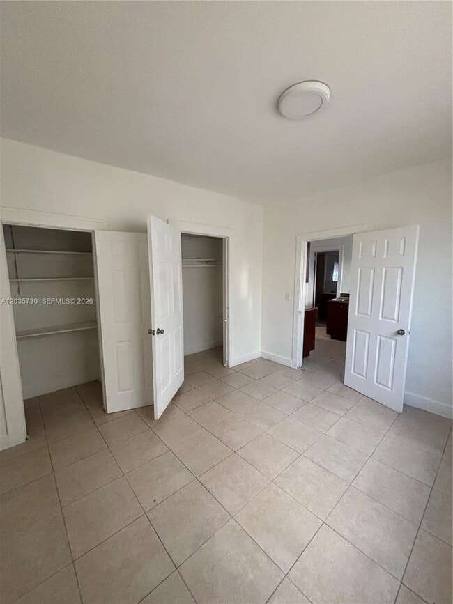 Building Photo - 1060 NW 47th St Unit 7