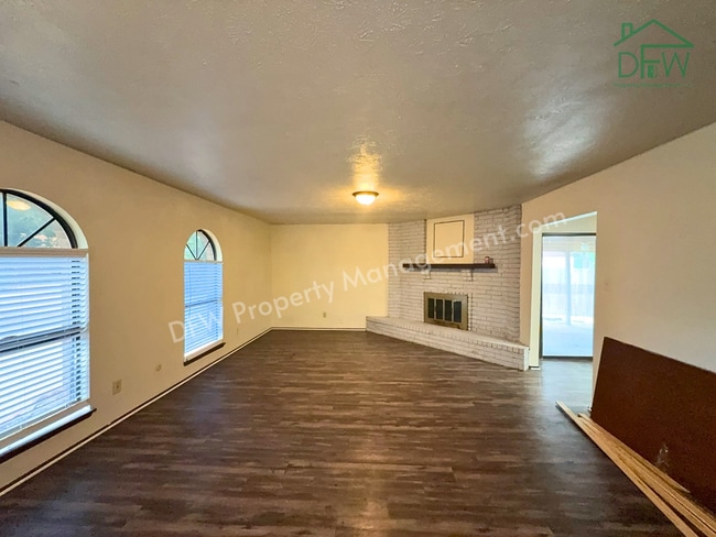 Photo - Cozy 3-Bedroom Home with Fireplace, Covered Patio & Large Fenced Backyard for Lease