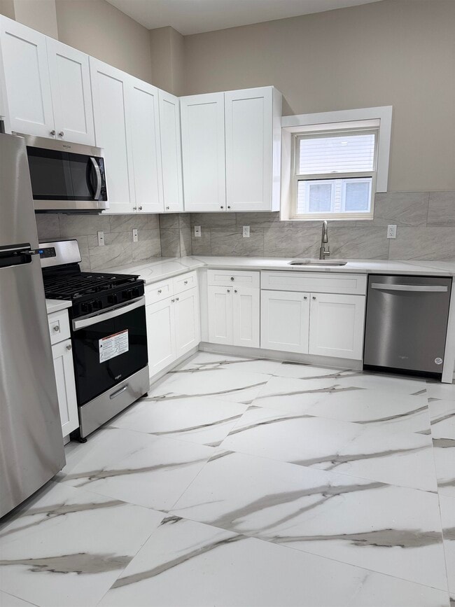 Building Photo - 213 Academy St Unit 1B