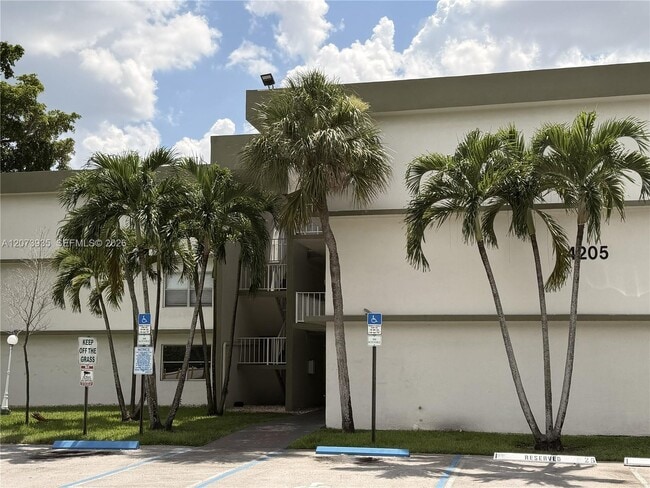 Building Photo - 4205 N University Dr Unit 202