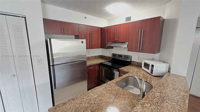 Photo - 771 N Pine Island Rd Unit 211