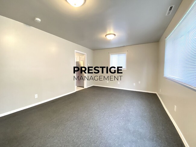 Photo - Updated Home with Central Air, Fenced Yard, and Two-Car garage!