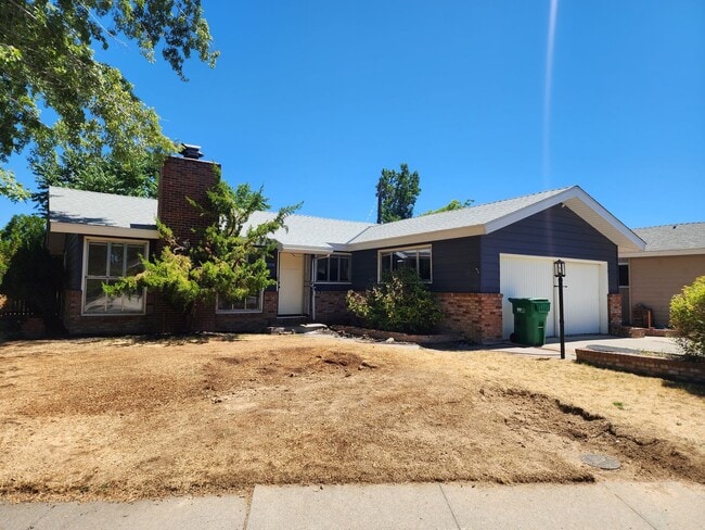 Building Photo - 4 bedroom, 2 bath, 2 car garage Rental