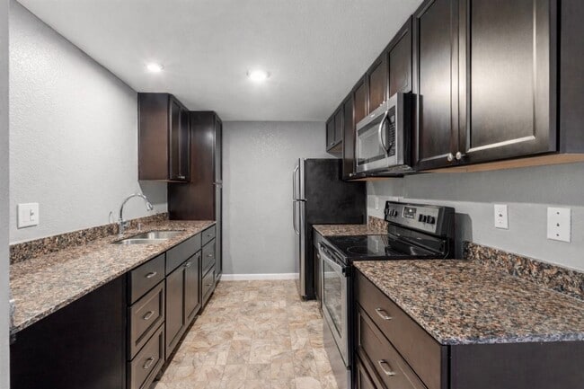 Photo - 2-Bedroom, 2-Bathroom End Unit with Covered Balcony