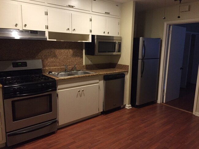 Updated kitchen, new stainless steel whirlpool appliances. - 1512 South Louisiana Street Unit Apt 2