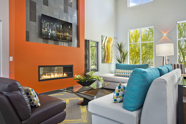 Resident lounge with TVs and ample seating