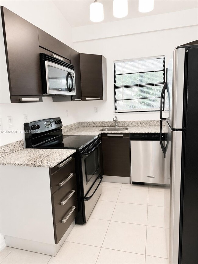 Building Photo - 11219 Royal Palm Blvd Unit 0