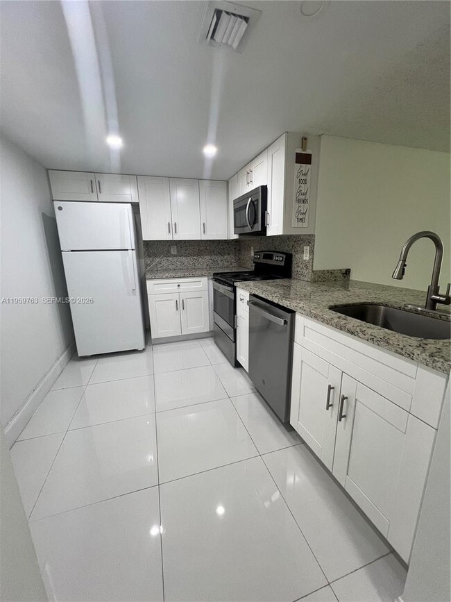 Building Photo - 14155 SW 87th St Unit E201