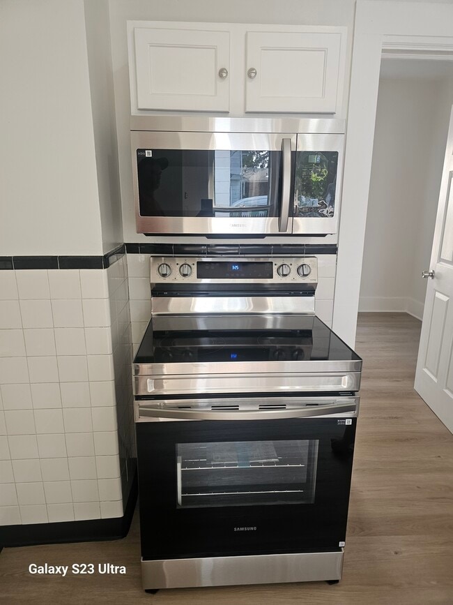 New stainless steel appliances - 210 E Chestnut St Unit #1
