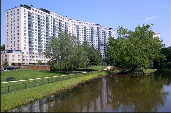 Fun social community, great for car-free living. Building view from lakeside - 10401 Grosvenor Plz Condo Unit 1319