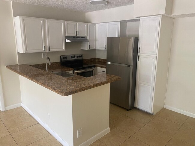 Building Photo - 601 Lyons Rd Unit 7105