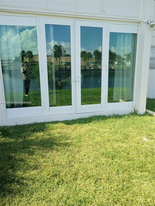 Building Photo - 8130 Sunrise Lakes Blvd Unit 107