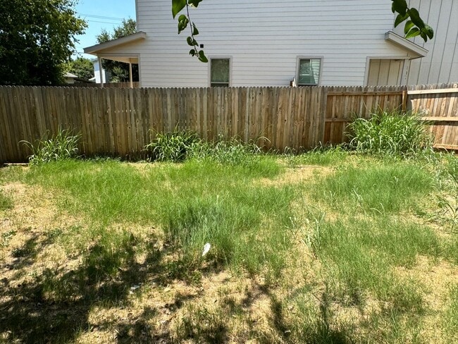 Photo - Move Fast! Gated Townhome Near Lackland AFB with Private Yard & EV-Ready Garage