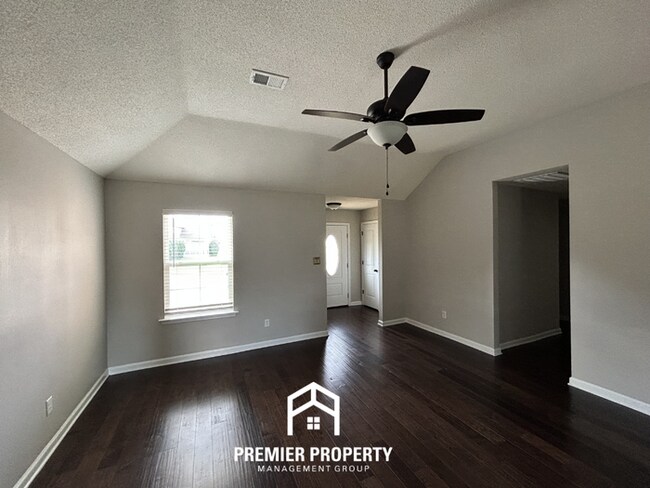 Photo - Modern 3BR/2BA in 38125 | Vaulted Ceilings, Stone Fireplace & 2-Car Garage