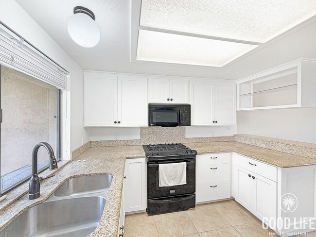 Photo - Inviting 2BD/2.5BA Townhouse in Pacific Beach with 2-Car Garage, In-Unit Laundry & Bay Proximity