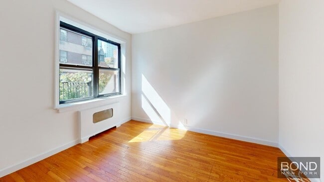 Building Photo - 257 E 61st St Unit 4A Rental