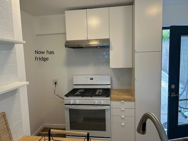 kitchen now has fridge - 10769 Redmont Ave