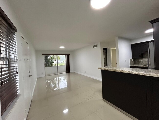 Building Photo - 8701 SW 141st St Unit L3