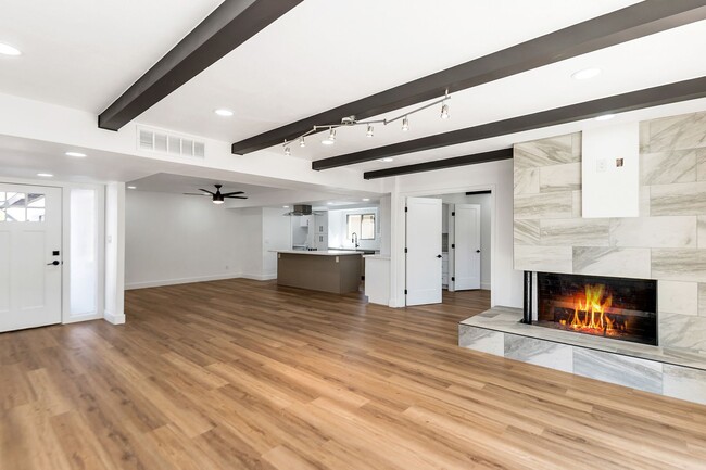 Photo - Remodeled 3 Bed 2 Bath 2 Car Garage Unfurnished 12 month lease with bonus room and AC in 2 car ga...