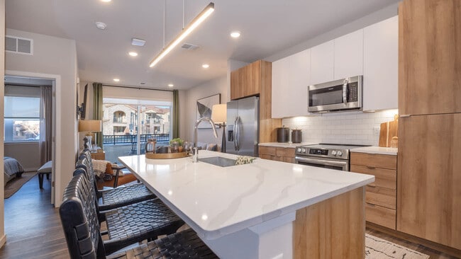 Kitchen with Stainless Steel Appliances and Quartz Countertops