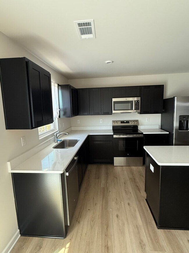 Photo - Like New Townhome!