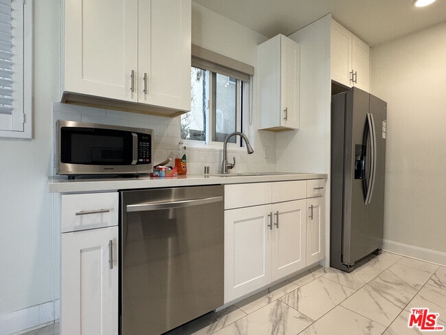 Building Photo - 1601 Veteran Ave Unit 101