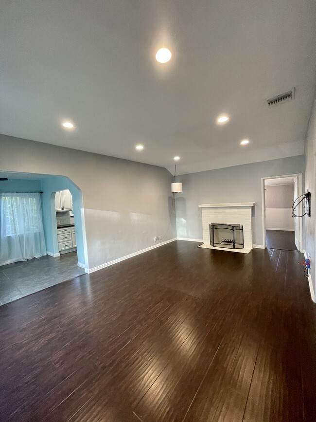 Living room with mounts for flat-screen TV - 328 N Lincoln St