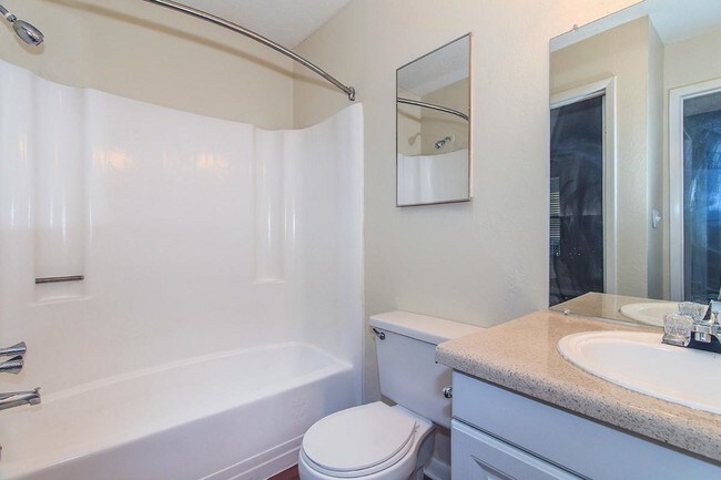 Baño de la habitación vista 1 - Coachman Club Apartments