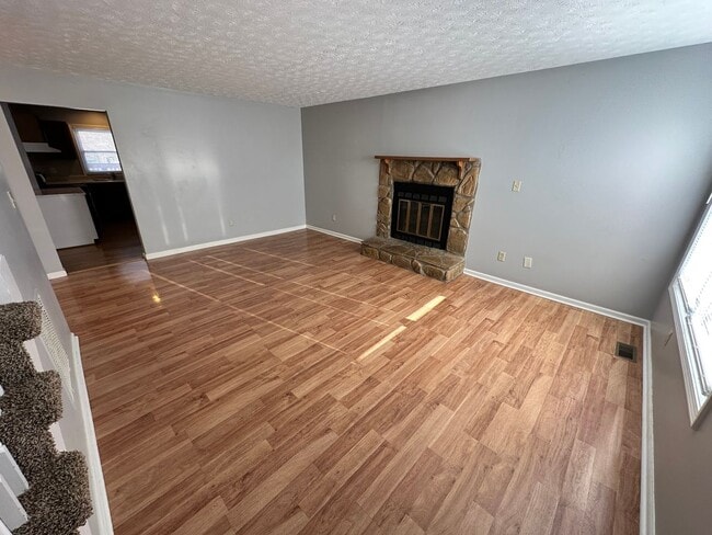 Photo - Nice 3 BR, 2 Bath Home! HW & Carpet Floors, Attached Garage, Fenced Backyard, Pets Ok!