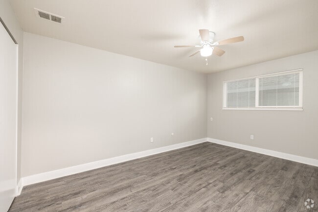 2BR, 1BA - 784SF - Primary Bedroom - Jasmine Springs