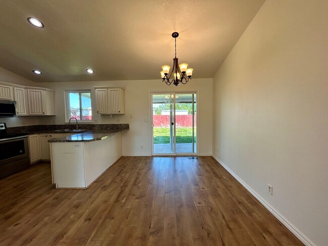 Photo - Spacious 4-Bedroom Home with RV Parking & No Backyard Neighbors