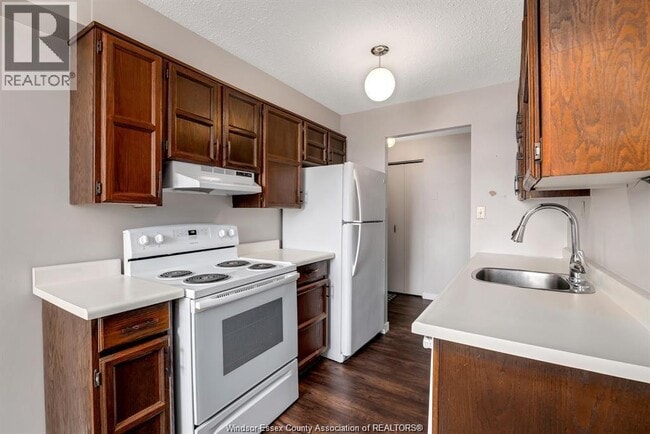 Photo - 3936 Wyandotte St E Unité 211