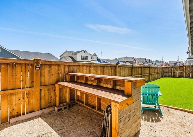 Photo - Furnished: New Modern Farmhouse Style Home with Abundant Light, Garage, Backyard. 30-day Min.