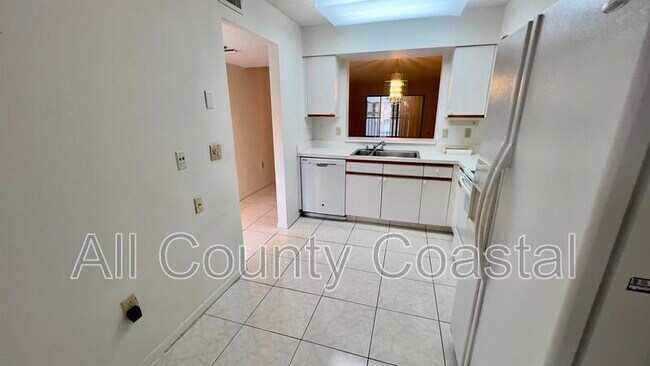 Photo - 6121 Pointe Regal Cir Unit 209