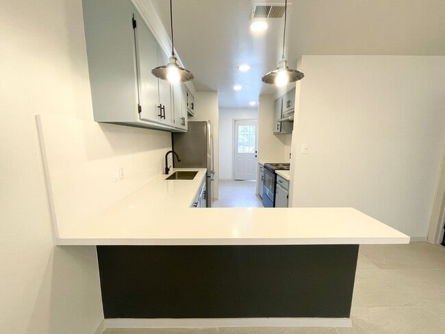 Photo - Centrally Located Apartment with Pool!!