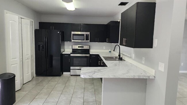 Photo - 5990 Braemar Pl Unit 104