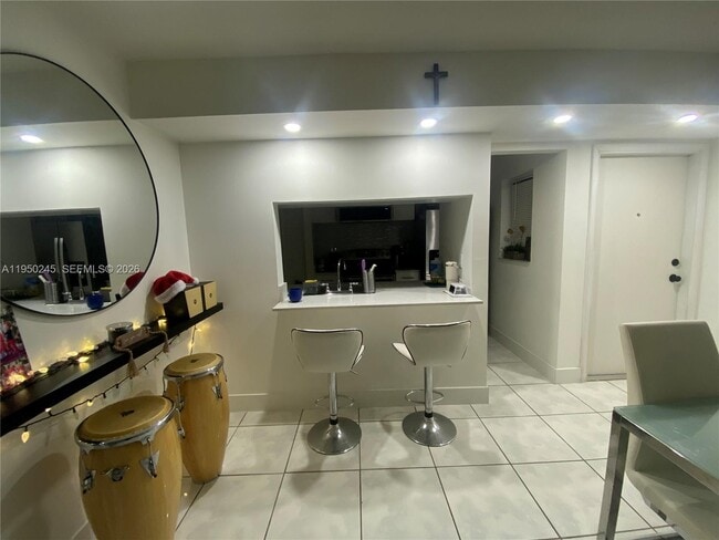 Building Photo - 9706 Hammocks Blvd Unit 103-33