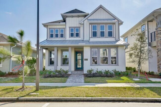 Building Photo - Gorgeous 4/3 Residence with a Private Back Lanai and a 3 Car Garage in the Delightful Laureate Pa...