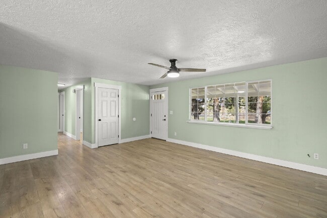 Photo - Charming 3-Bedroom Bend Home on 1/2 Acre with Expansive Yard, Mature Trees & Covered RV/Boat Storage