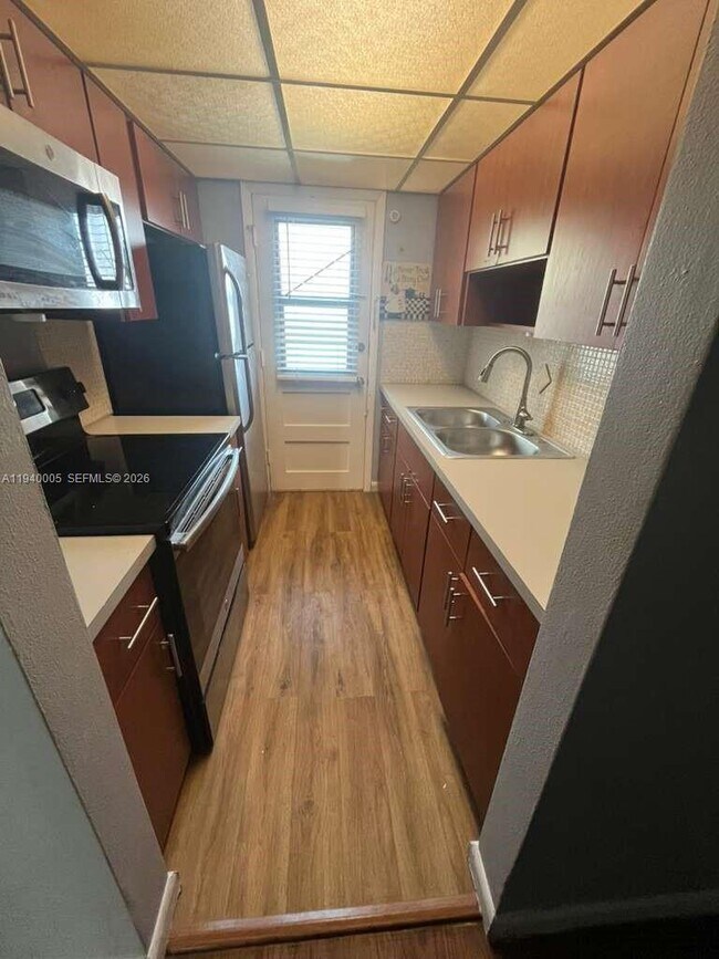 Building Photo - 1475 NE 125th Terrace Unit 410B1