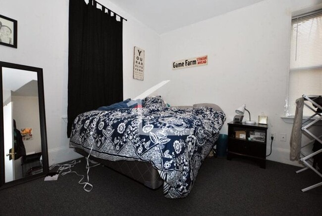 Photo - 4BR 2Bth unit. Great location! On T, walk to supermarket, restaurants.