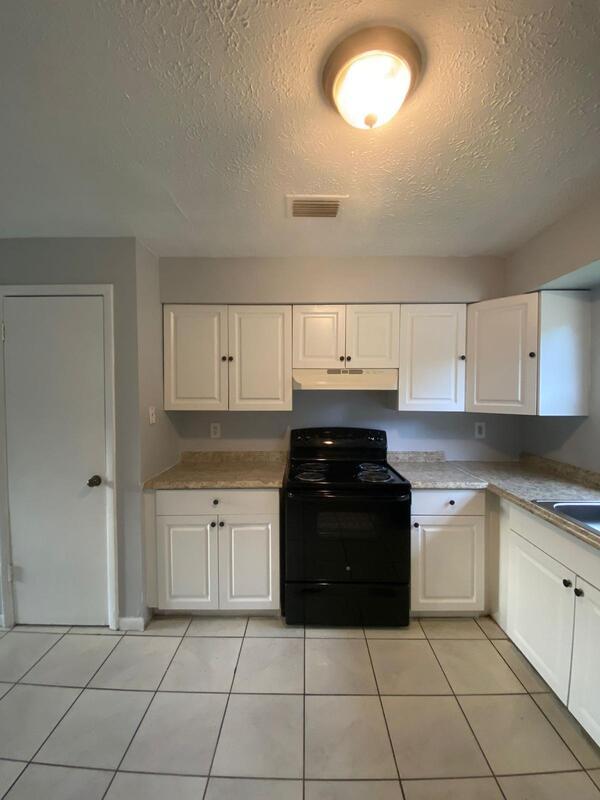 Building Photo - 1413 E 99th Ave Unit B