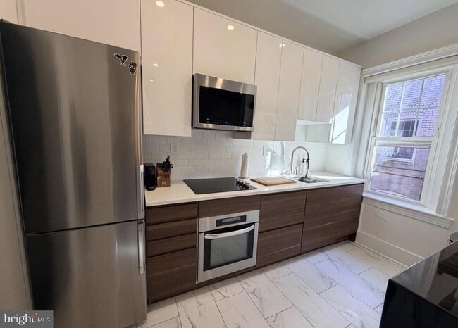 Building Photo - 1332 15th St NW Unit 44